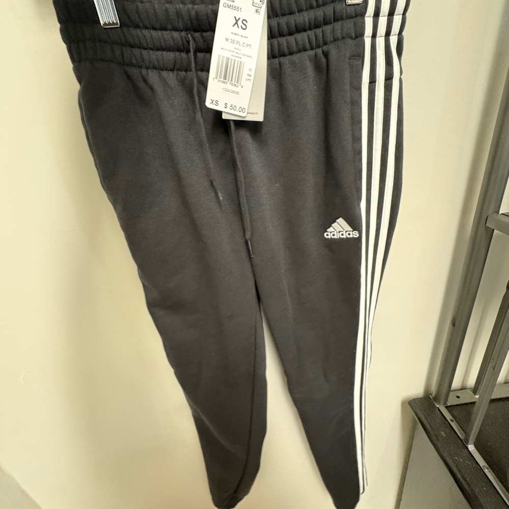 Adidas women’s  Black Joggers with White Stripes